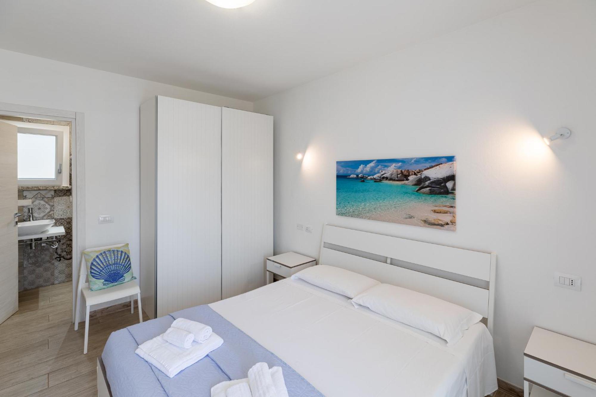 Case Vacanze "Bianco Mare" Порто-Пино Номер фото